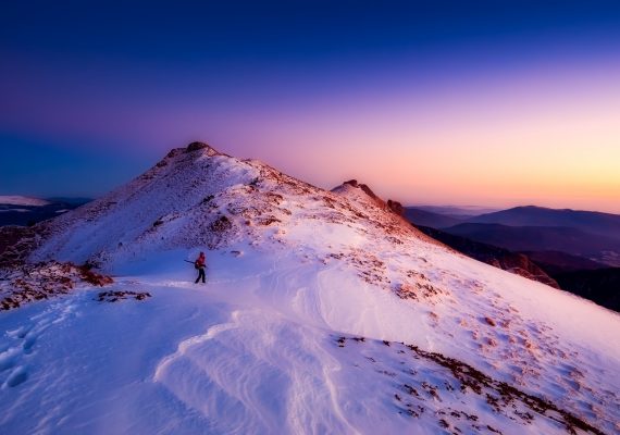 Mountain view at dusk, banner image, Skiing, Elaine's Travel